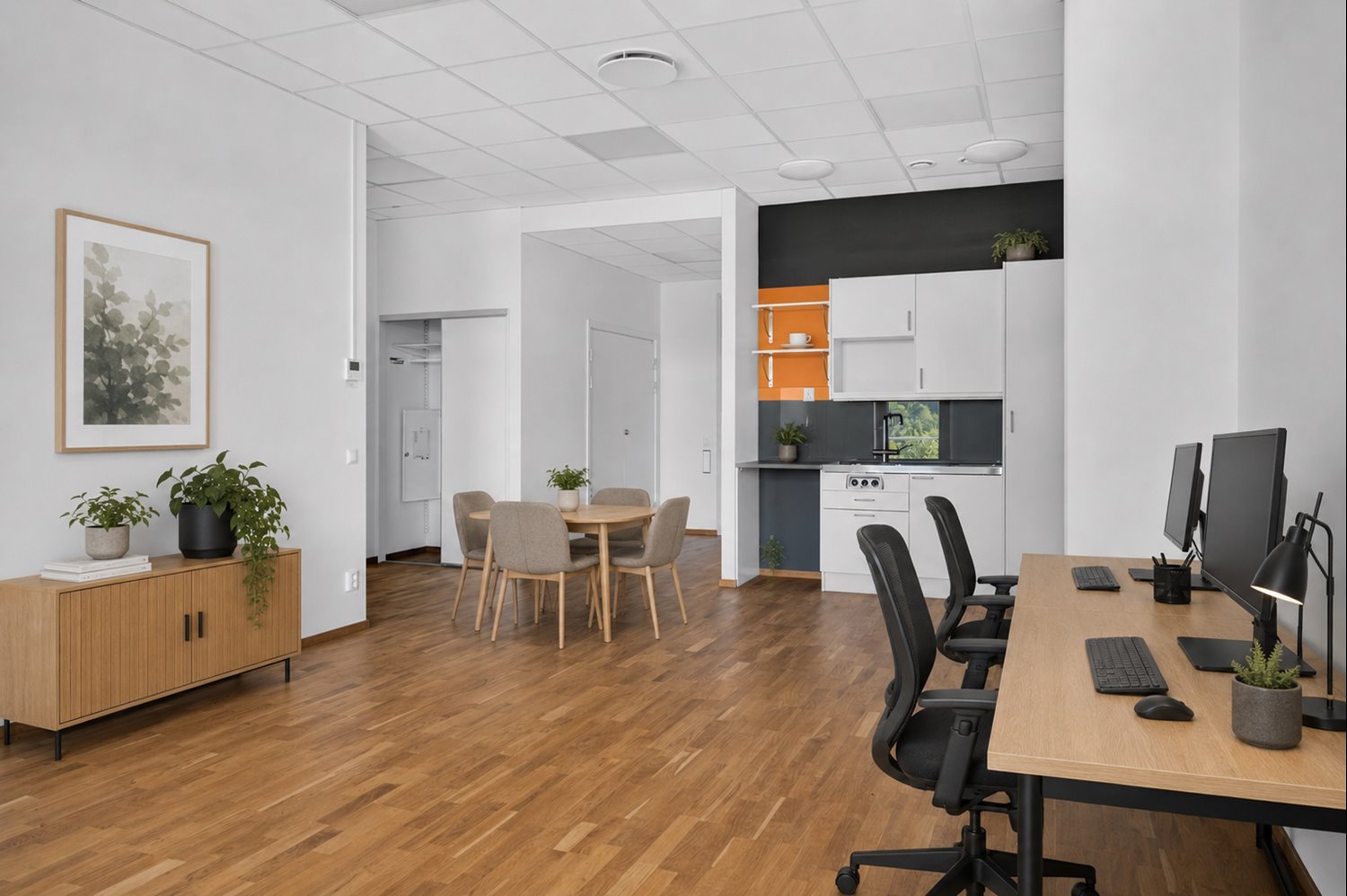 AI-visualisering – kontor med lunchplats och två arbetsplatser